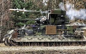 Image result for Wire-Guided TOW MISSILE