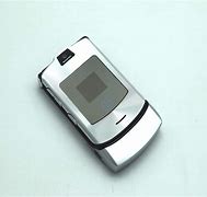 Image result for Mini Flip Phone Silver