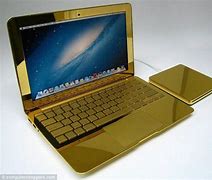 Image result for Brown and Gold Laptop