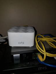Image result for NETGEAR Orbi Tri-band Whole Home Mesh WiFi System