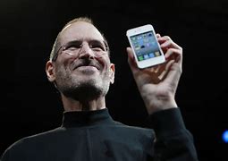 Image result for Steve Jobs Holding an Apple