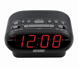 Image result for Magnavox 108 AM/FM Alarm Clock Portable Radio