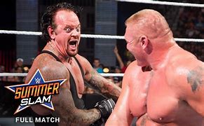 Image result for Brock Lesnar Beats Undertaker