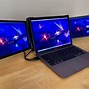 Image result for mac 3 monitors