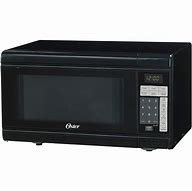 Image result for Oster 900W Microwave Oven