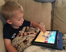 Image result for Kid with iPad