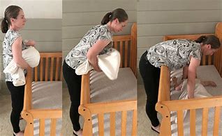 Image result for Lifting Baby Boy From Cot