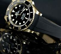 Image result for Rolex Submariner Gold Black Leather Strap