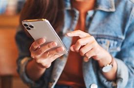 Image result for Someone Holding iPhone