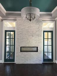 Image result for White Ledger Stone Fireplaces