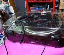 Image result for Yamaha Black Tulip Direct Drive Turntable