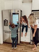 Image result for Child Using Family Hub Fridge