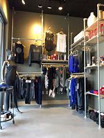 Image result for Clothing Racks for Store Displays