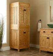 Image result for Tall Floor Cabinet with Doors