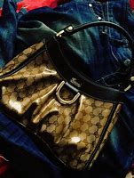 Image result for Gucci and Louis Vuitton