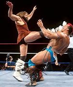 Image result for Professional Wrestling Double-Team Maneuvers