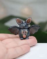 Image result for Fruit Bat Figurine