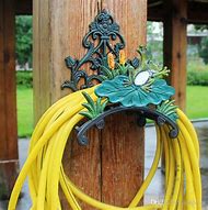 Image result for Animal Garden Hose Holder