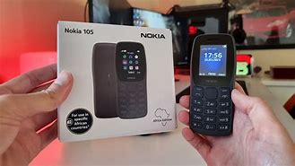 Image result for Nokia 105 in Hand with Gloves On