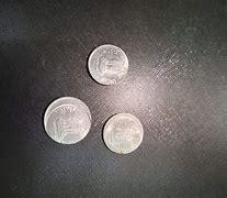 Image result for Off-Center Coins Stack