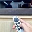 Image result for Apple TV and Remote On Wooden Table