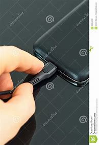 Image result for Carging Cell Phone