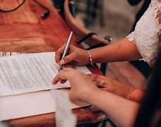 Image result for Women Signing Documents