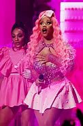 Image result for Nicki Minaj in Pink Shirt and Blue Jeans