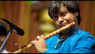 Image result for Famous Indian Flute Player