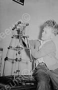 Image result for Boy Playing with Tinker Toys