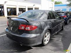 Image result for All-Black Mazda 6 2003