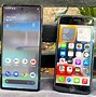 Image result for Pixel 6A Next to iPhone