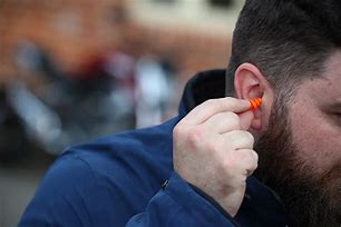 Image result for Wearing Ear Plugs