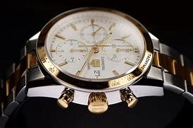 Image result for Tag Heuer Carrera Calibre 16 Gold Chronograph