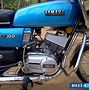 Image result for RX 100 Metallic Blue Tank and Side Door
