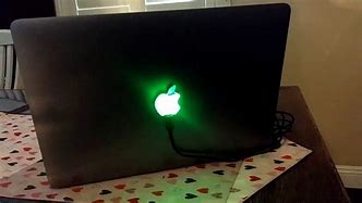 Image result for Glowing Apple Logo MacBook