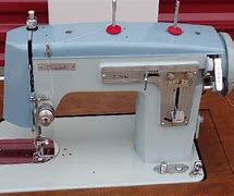 Image result for Dressmaker Deluxe Zig Zag Sewing Machine