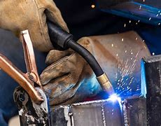 Image result for Welding Gun in Use