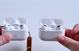 Image result for Black Air Pods That Are Round