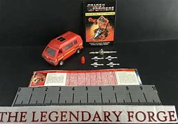 Image result for G1 Ironhide and Ratchet Toys
