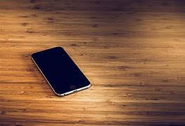 Image result for Red iPhone On the Table