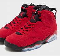 Image result for Orange and Black Jordan 6s