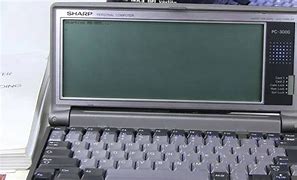 Image result for Sharp Palm Computer