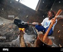 Image result for Garifuna Woman Cooking On an Open Fire