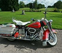 Image result for Couple On Electra Glide