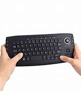 Image result for Keyboard with Built in Trackball