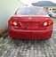 Image result for 2010 Toyota Corolla Maroon Color
