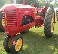 Image result for Ancient Farm Tractor