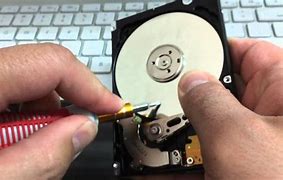 Image result for Hitachi HDD Hidden Screw