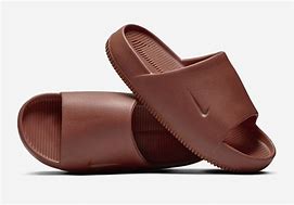 Image result for Nike Slides Orange